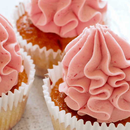 Cup Cakes With Pink Icing - Ginja B