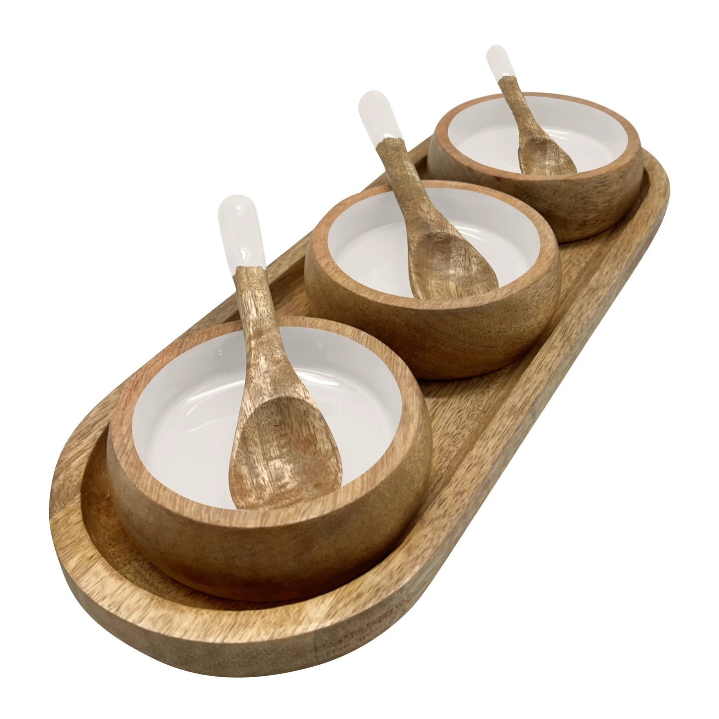 Set of three wooden bowls with white interiors and wooden spoons on a wooden tray.