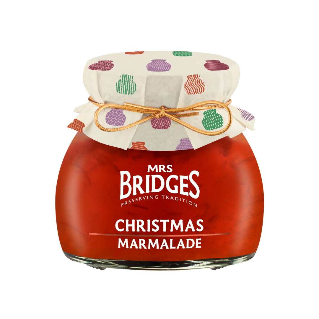 Mrs Bridges Christmas Marmalade with toasted bread, croissants, oranges, cranberries and festive Christmas decorations.